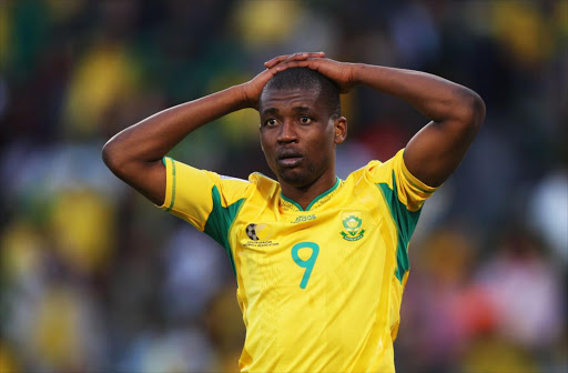 Katlego Mphela of South Africa looks on during the 2010 FIFA World Cup South Africa Group A match between France and South Africa at the Free State Stadium on June 22, 2010 in Mangaung/Bloemfontein, South Africa