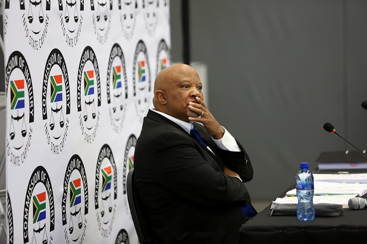 Former deputy finance minister Mcebisi Jonas prepares to testify at the Zondo commission of inquiry into state capture in Parktown, Johannesburg on August 24 2018.