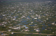 A general view of houses seen from the air near Nhamatanda village, Beira, Mozambique, following Cyclone Idai.