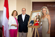 A member of the Canada Club, with Prince Albert of Monaco and artist Stefanie van Zyl (right)  Picture: Canadian Club de Monaco / Philippe Fitte