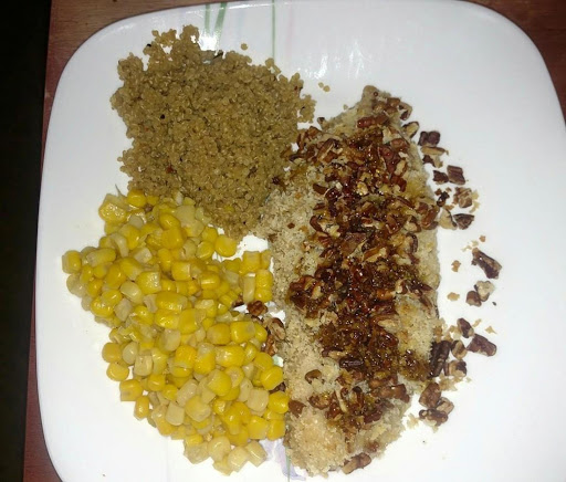 Maple-Mustard-Pecan Panko crusted chicken, drizzled with the bourbon sauce, served with quinoa and corn.