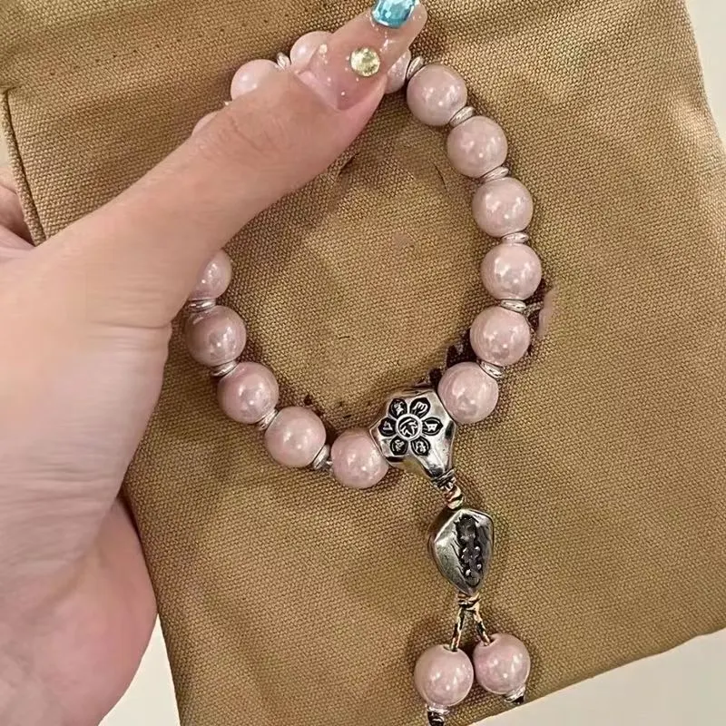 Title 4, Paars keramisch geluks kralen armband ornament...
