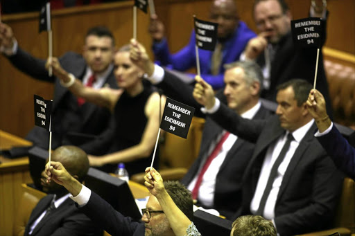 DA MPs stage a silent protest in parliament on Thursday night over the deaths of mentally ill patients.