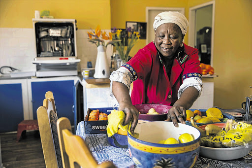 Domestic worker Stella Nkosi in her employer's home. Ninety percent of domestic workers earn less than R3,120 a month.