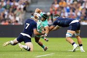 The Springboks' Cheslin Kolbe is tackled by Rory Darge of Scotland in their 2023 Rugby World Cup pool B match at Stade Velodrome in Marseille on Sunday.