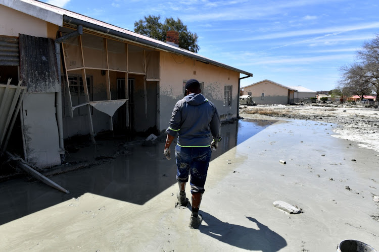 Residents tried to save the little that was left after the the mine’s tailings dam wall collapsed on Sunday.