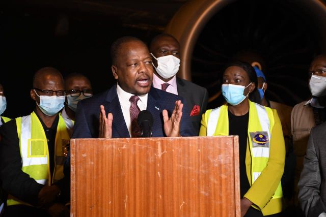 Health CS Mutahi Kagwe receives a donation of 4.3 million Johnson and Johnson vaccine doses from the German government via the Covax facility at JKIA on December 6