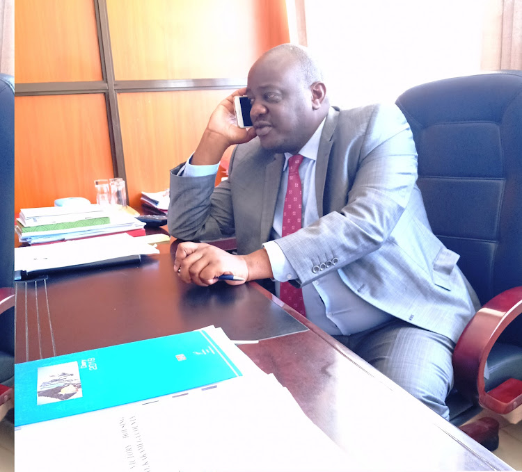 Kakamega Land executive Alfred Matianyi in his office