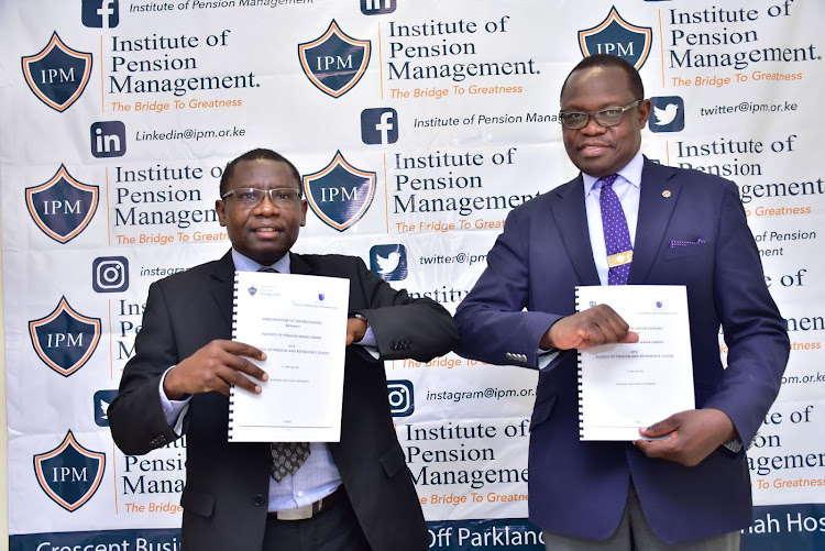 Octagon Africa Group CEO Fred Waswa and School of Pension & Retirement Studies(SPRS) Director Edward Odundo during the MOU signing