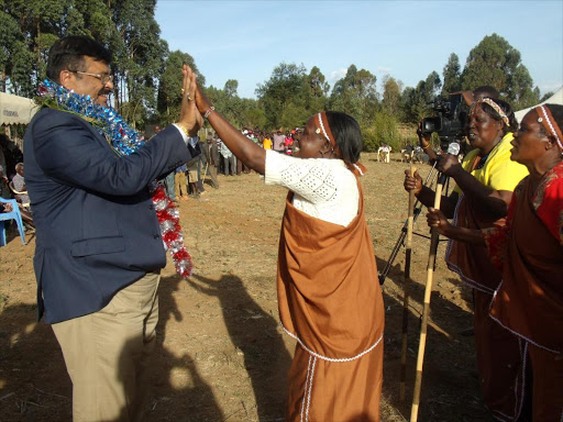 Kesses Jubilee hopeful Swarrup Mishra (garlanded) joins dancers in Mogobich village, Uasin Gishu, on June 30 last year /MATHEWS NDANYI