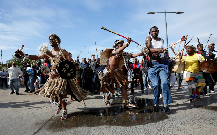 Supporters of new AmaZulu King Misuzulu kaZwelithini arrive ahead of the final ceremony of his coronation in Durban on October 29 2022.