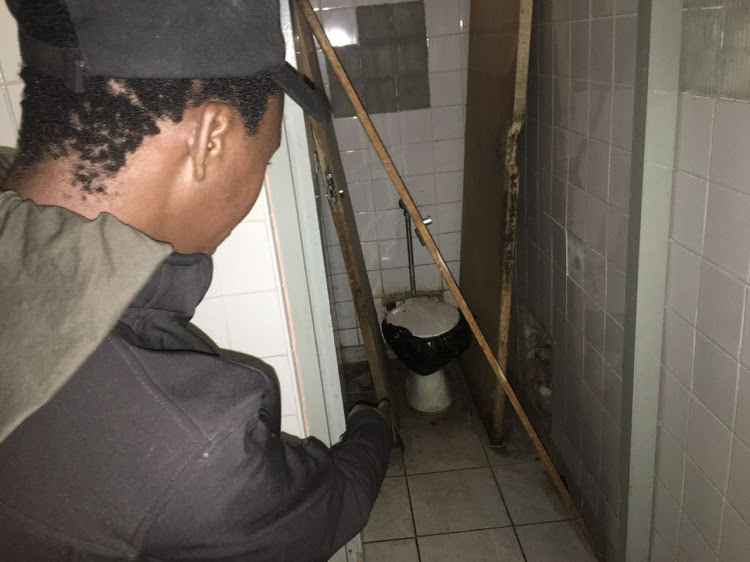 A Walter Sisulu University student shows Dispatch the state of a toilet that has no door