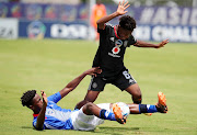 Wandile Madlala of Maritzburg United challenged by Njabulo Mndebele of Orlando Pirates during the DStv Diski Challenge 2022/23 match between Maritzburg United and Orlando Pirates at the Sugar Ray Xulu Stadium, Clermont on the 04 February.