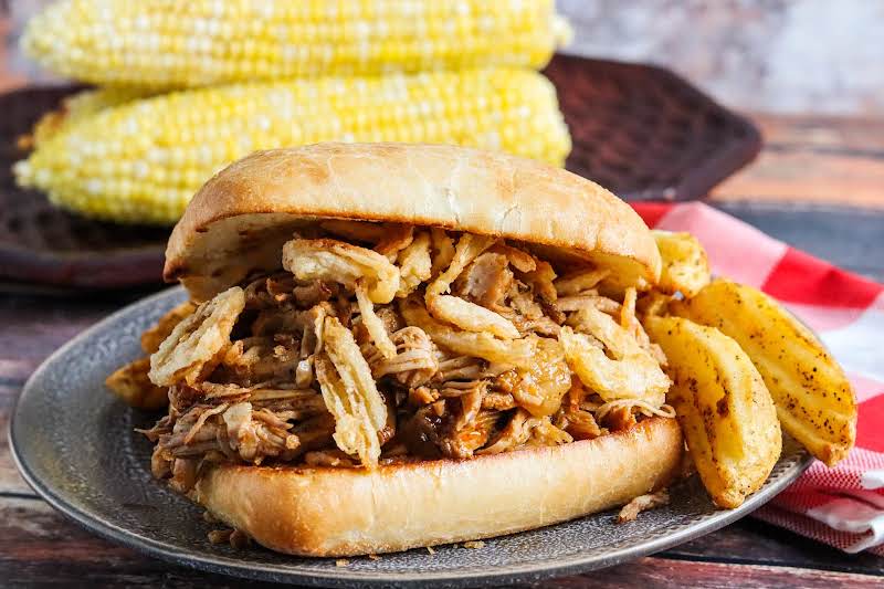 Assembled Pulled Pork & Crispy Onion Ciabatta Sandwich.