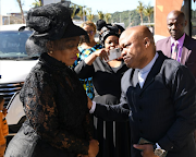 Deputy transport minister Sindisiwe Chikunga is comforted by KZN premier Sihle Zikalala at a memorial service for her son, daughter-in-law and four grandchildren, who were killed in an accident last week.