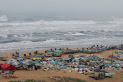 Boats are seen parked on deserted Marina beach during rains before Cyclone Nivar's landfall, in Chennai, India, November 25, 2020. 