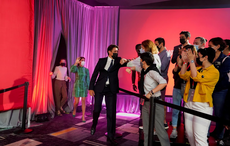 Canada's Liberal Prime Minister Justin Trudeau is congratulated by supporters during the election night party in Montreal, Quebec. Reuters/Carlos Osorio