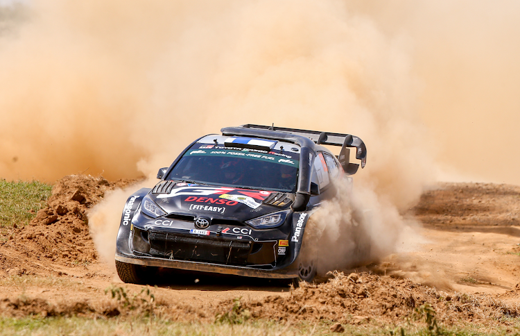 A rally car leaves behind a cloud of dust at the WRC Safari Rally shakedown in Naivasha on March 27, 2024.