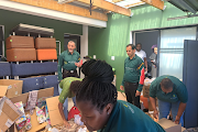 Cape Town metro police arrested 10 people and recovered relief packs, meant for fire victims, that were stolen from Gift of the Givers' warehouse at the weekend. 