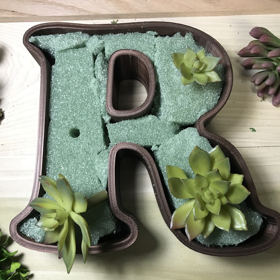 Plotting where to put the succulents before gluing