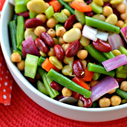 A quick and easy bean salad with a zesty sweet dressing that is perfect for all your spring and summer meals.  This salad is perfect for potlucks, family reunions, picnics and pool parties.