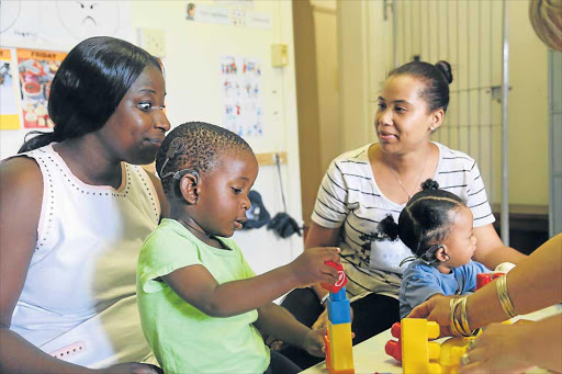 MAKING FRIENDS: Lillian and Ethan Gora get to know Rowena Williams and her son Cairo Picture: SIBONGILE NGALWA