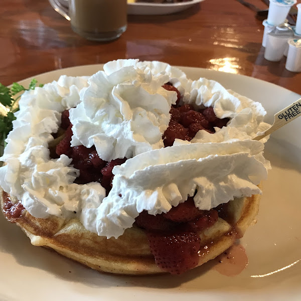 Gluten Free Belgian Waffle with Strawberries and whipped cream. AMAZING!!!!