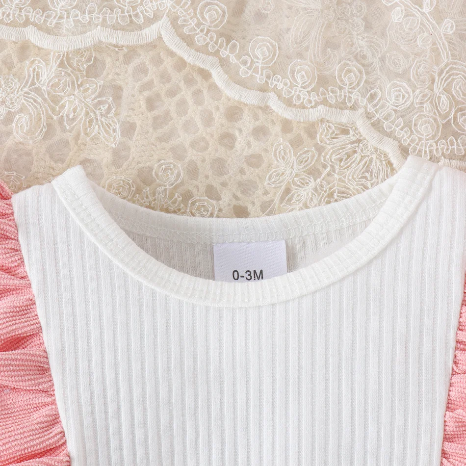 Robe à bretelles en velours côtelé à manches longues pour bébé, parfaite pour le printemps et l'automne. Confort et élégance.