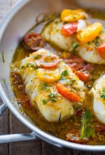 Pan-Seared Cod in White Wine Tomato Basil Sauce was pinched from <a href="http://bakerbynature.com/pan-seared-cod-in-white-wine-tomato-basil-sauce/" target="_blank">bakerbynature.com.</a>