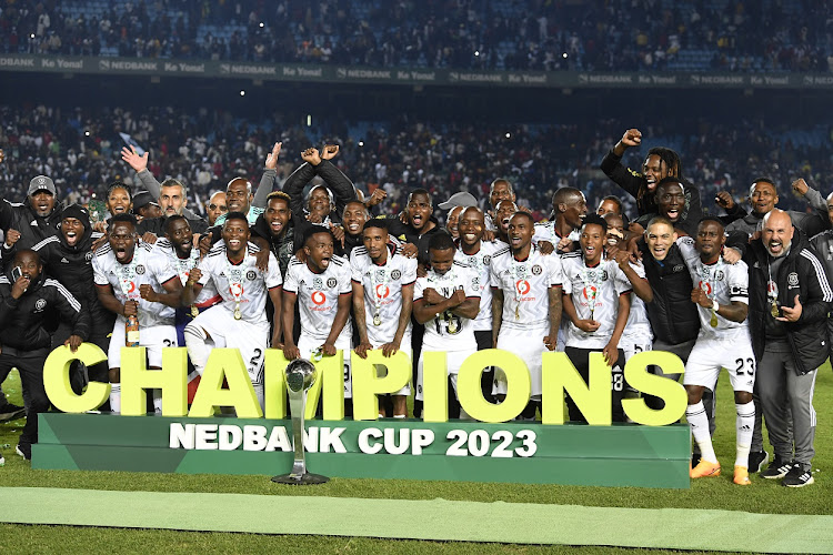 Orlando Pirates players celebrate winning the Nedbank Cup after the final against Sekhukhune United at Loftus Versfeld on March 27 2023.