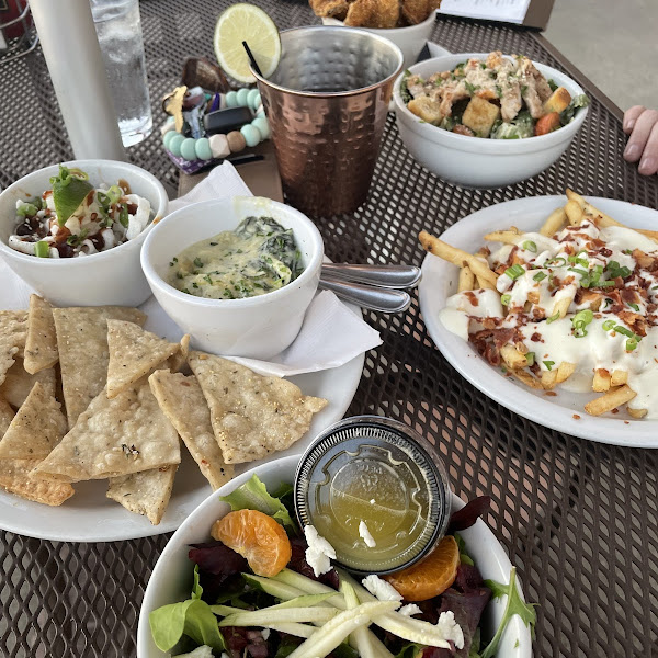 App sampler platter (only fried pickles are not gf), side salad, loaded fries, Cesar salad (not mine, would be gf w/o croutons) and mule’s!