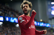 Mohamed Salah of Liverpool celebrates scoring his third goal during the Uefa Champions League Group A match against Rangers at Ibrox Stadium in Glasgow on October 12 2022.