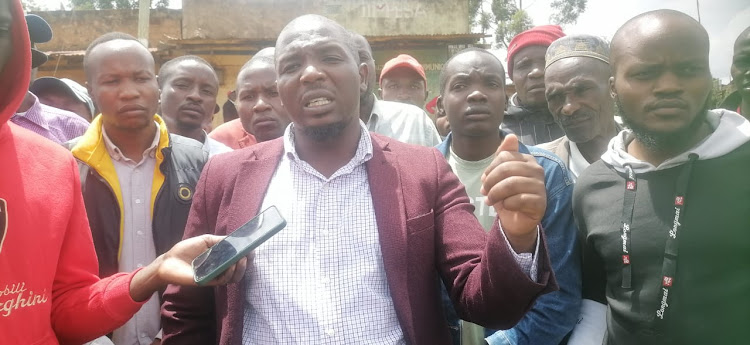 Angry Gesusu MCA Anthony Kerage speaking to journalists shortly after police ordered members of the public off the venue in Gesusu town (IMAGE BY MAGATI OBEBO)