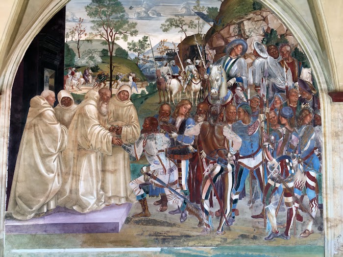 Benedict recognising and welcoming Totila, scene from the Life of St Benedict, 1497-1499, by Luca Signorelli (ca 1441-1450-1523), fresco, Great Cloister, Abbey of Monte Oliveto Maggiore