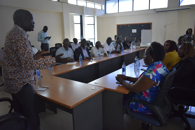 Homa Bay Deputy Governor Oyugi Magwanga speaks during a meeting where they signed deals with Care Kenya organisation to grow sorghum and groundnuts in Homa Bay on June 2023