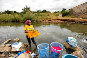 CLEAN BREAK: Residents of water-starved Malamulele in Limpopo use Luvuvhu River to do their laundry, wash cars and fish. Support for the ANC in most rural provinces, such as Limpopo, Mpumalanga and KwaZulu-Natal,  has been on the decline because of nondelivery of services Picture: MOELETSI MABE