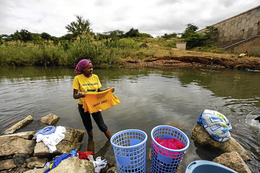 CLEAN BREAK: Residents of water-starved Malamulele in Limpopo use Luvuvhu River to do their laundry, wash cars and fish. Support for the ANC in most rural provinces, such as Limpopo, Mpumalanga and KwaZulu-Natal, has been on the decline because of nondelivery of services Picture: MOELETSI MABE