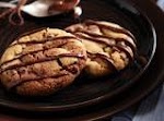 Chocolate Chip Peanut Butter Swirl Cookies was pinched from <a href="http://www.foodnetwork.com/recipes/chocolate-chip-peanut-butter-swirl-cookies-recipe/index.html" target="_blank">www.foodnetwork.com.</a>