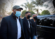 Ndaba Mandela, centre, is seen arriving at the funeral of Zindzi Mandela who died on Monday due to a Covid-19 related illness. 