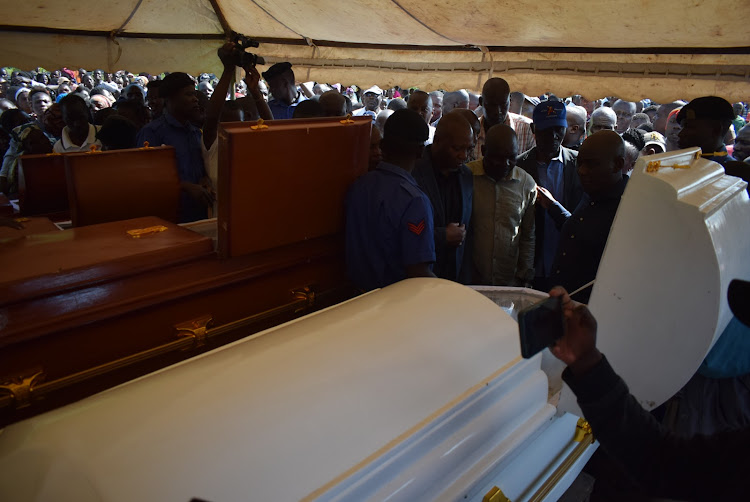 MPs Caroli Omondi (Suba South) , Daniel Manduku (Nyaribari Masaba) and Gideon Ochanda (Bondo) view te bodies of the people killed by floods at Sindo market in Suba South constituency on May 15,2024