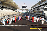 The F1 drivers pose for the Class of 2020 photo on the grid before the F1 Grand Prix of Abu Dhabi at Yas Marina Circuit on December 13 2020 in Abu Dhabi, United Arab Emirates.