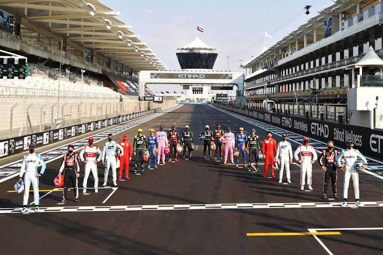 The F1 drivers pose for the Class of 2020 photo on the grid before the F1 Grand Prix of Abu Dhabi at Yas Marina Circuit on December 13 2020 in Abu Dhabi, United Arab Emirates.