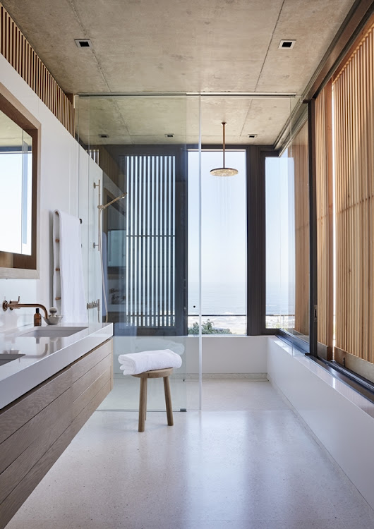 The main bathroom features a shower with a view.