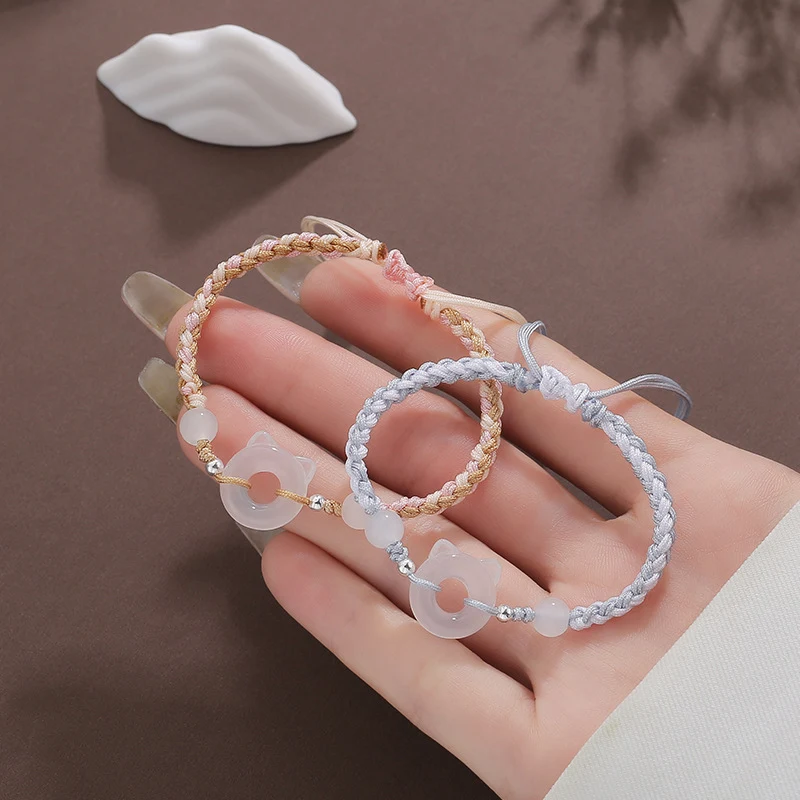 Dragonne tissée avec boucle en résine Chat Paix, simple et élégante. Sécurisez votre appareil avec style et tranquillité, pratique et facile à utiliser.