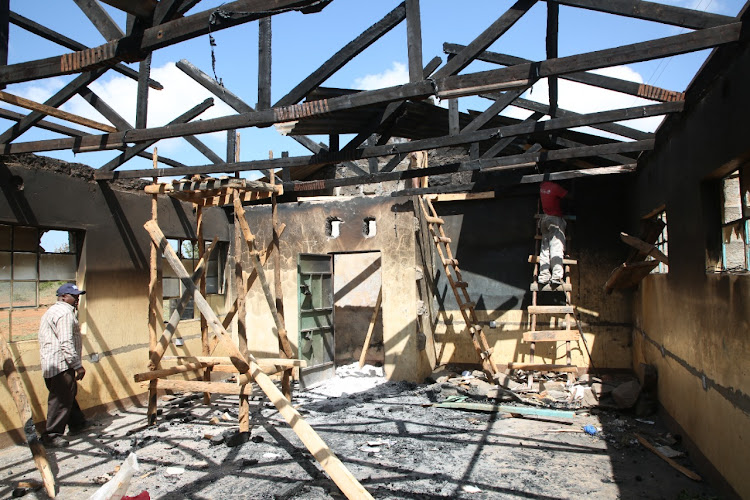 Burnt classroom being built.