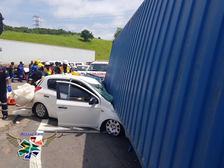 Firefighters and paramedics battled for nearly half an hour to free two people trapped inside the wreckage of the car.