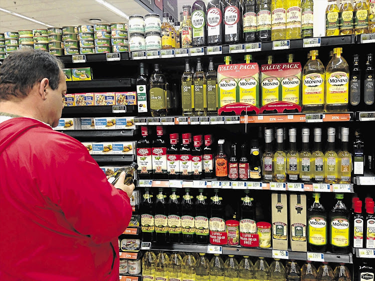 A shopper tries to make up his mind. File photo.