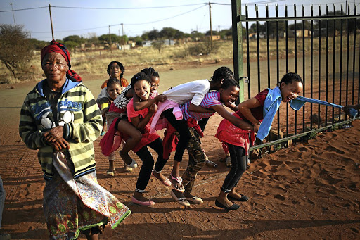 Mariana Chibia and children in Platfontein, Northern Cape. The community consists of two San tribes