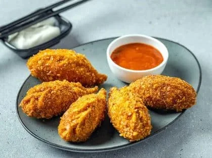 Peri Peri Chicken Kurkure Momos [8 Pieces]