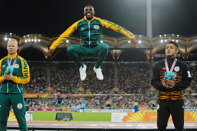 Ndodomzi Jonathan Ntutu jumps for joy after winning gold at the Commonwealth Games in Gold Coast in 2018.Joining him on the podium are teammate Hilton Langenhoven, left, and Mohamad Ali Hanafiah Muhammad Afiq of Malaysia. Picture: GALLO IMAGES/ROGER SEDRES